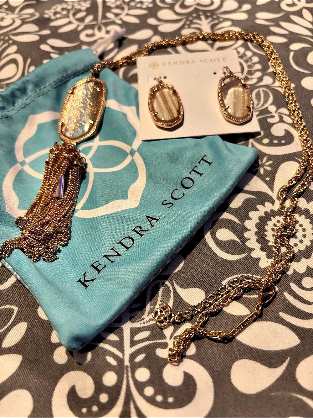 Kendra Scott Rayne Tassel Necklace and Matching Earring Set gold, and clear ston